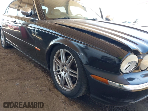 2005 Jaguar XJ Vanden Plas z VIN SAJWA82C05SG47589, wystawiony jako IAAI lot #42409697 z przebiegiem 222 598 mil mil oraz . Historia ofert i sprzedaży dostępna na DreamBid. Obrazek 6.