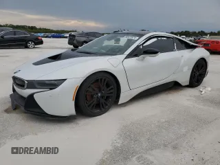 2015 BMW i8 z VIN WBY2Z2C56FV392042, wystawiony jako Copart lot #66972874 z przebiegiem Nie podano mil oraz Szkody całkowita. Historia ofert i sprzedaży dostępna na DreamBid. Obrazek 1.