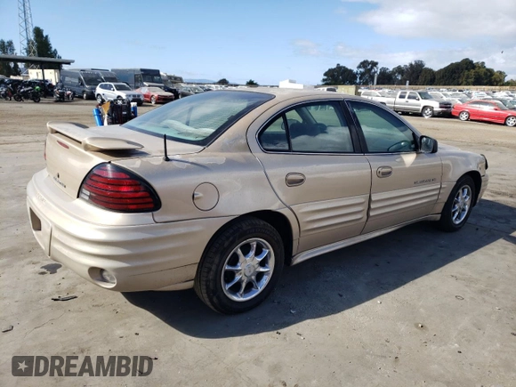 2001 Pontiac Grand Am SE z VIN 1G2NE52T91M583582, wystawiony jako Copart lot #77808974 z przebiegiem 126 219 mil mil oraz Szkoda całkowita • Salvage title. Historia ofert i sprzedaży dostępna na DreamBid. Obrazek 3.