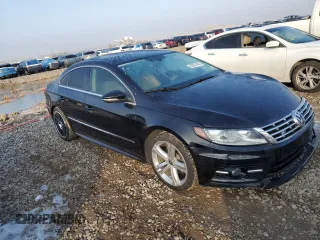 2014 Volkswagen CC R-Line with VIN WVWBP7AN0EE505098, listed as a Copart auction lot 83257454 with 91,108 mi miles and Salvage Title. Bid and sale history available at carsss.com. Image 4.