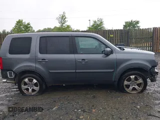 2012 Honda Pilot EX-L z VIN 5FNYF4H5XCB080387, wystawiony jako IAAI lot #42253266 z przebiegiem 185 471 mil mil oraz . Historia ofert i sprzedaży dostępna na DreamBid. Obrazek 13.