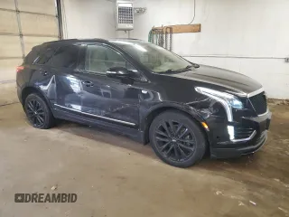 2021 Cadillac XT5 AWD Sport with VIN 1GYKNHRS1MZ103033, listed as a Copart auction lot 58586425 with 65,229 mi miles and Salvage title. Bid and sale history available at DreamBid. Image 4.