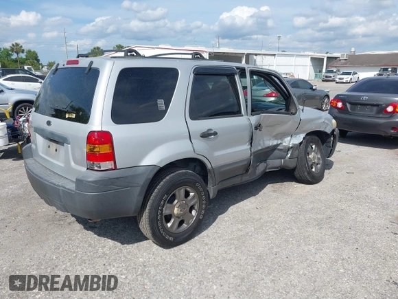 2005 Ford Escape XLS Value with VIN 1FMYU02Z35KD87671, listed as a IAAI auction lot 41880824 with 278,689 mi miles. Bid and sale history available at carsss.com. Image 4.