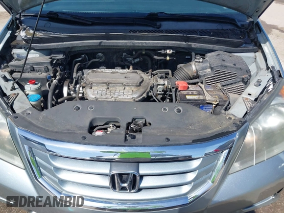 2010 Honda Odyssey EX with VIN 5FNRL3H44AB059711, listed as a IAAI auction lot 42057760 with 225,486 mi miles and . Bid and sale history available at DreamBid. Image 10.