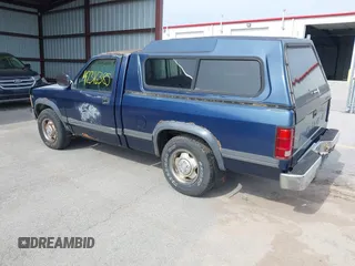 1991 Dodge Dakota z VIN 1B7GG26X3MS259618, wystawiony jako IAAI lot #42316385 z przebiegiem 174 734 mil mil oraz . Historia ofert i sprzedaży dostępna na DreamBid. Obrazek 3.