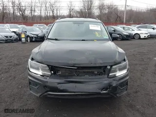 2018 Volkswagen Tiguan S with VIN 3VV1B7AX9JM091210, listed as a IAAI auction lot 41683380 with 63,627 mi miles. Bid and sale history available at carsss.com. Image 12.