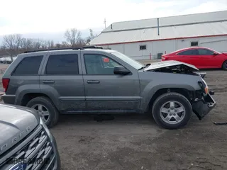 2007 Jeep Grand Cherokee Laredo with VIN 1J8GR48K57C556517, listed as a IAAI auction lot 41534166 with 158,914 mi miles. Bid and sale history available at carsss.com. Image 13.
