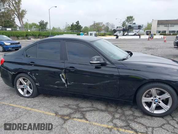 2014 BMW 3 Series 320i with VIN WBA3B1G57ENS80800, listed as a IAAI auction lot 42097683 with 152,924 mi miles. Bid and sale history available at carsss.com. Image 6.