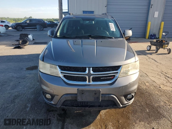 2013 Dodge Journey SXT with VIN 3C4PDCBG0DT522408, listed as a Copart auction lot 62699195 with 130,665 mi miles and Salvage title. Bid and sale history available at DreamBid. Image 5.