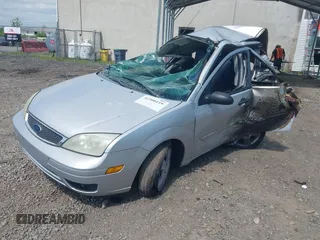 2006 Ford Focus S with VIN 1FAFP37N06W165504, listed as a IAAI auction lot 42300119 with Not provided miles and . Bid and sale history available at DreamBid. Image 2.