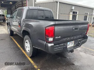 2021 Toyota Tacoma SR z VIN 5TFCZ5AN2MX279975, wystawiony jako IAAI lot #42477503 z przebiegiem 50 690 mil mil oraz . Historia ofert i sprzedaży dostępna na DreamBid. Obrazek 13.
