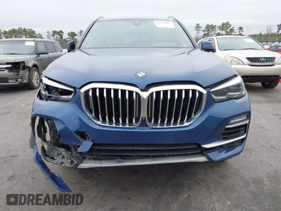 2021 BMW X5 sDrive40i with VIN 5UXCR4C0XM9G16295, listed as a IAAI auction lot 41534953 with 28,722 mi miles. Bid and sale history available at carsss.com. Image 6.