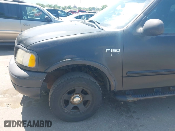 2000 Ford F-150 XL z VIN 2FTRX18L8YCA51967, wystawiony jako IAAI lot #42478391 z przebiegiem Nie podano mil oraz . Historia ofert i sprzedaży dostępna na DreamBid. Obrazek 6.
