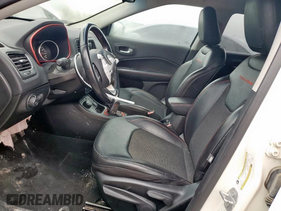 2020 Jeep Compass Trailhawk with VIN 3C4NJDDB3LT189398, listed as a Copart auction lot 59376995 with 75,674 mi miles and Salvage title. Bid and sale history available at DreamBid. Image 7.