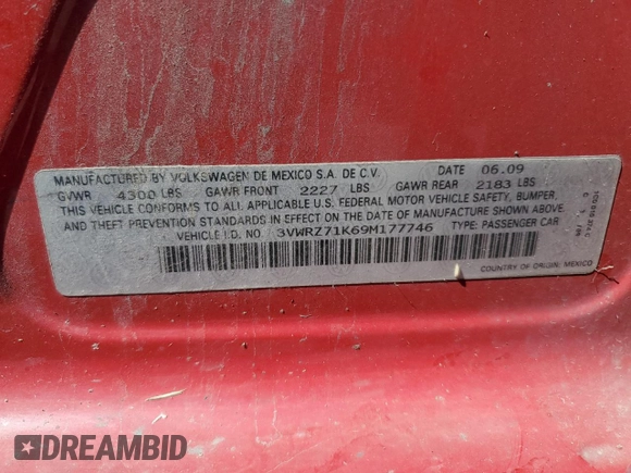 2009 Volkswagen Jetta SE with VIN 3VWRZ71K69M177746, listed as a Copart auction lot 70990074 with 128,390 mi miles and Salvage title. Bid and sale history available at DreamBid. Image 14.