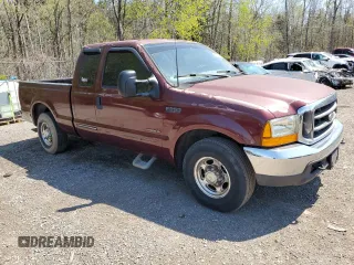 2000 Ford F-250 XL with VIN 1FTNX20F5YED86494, listed as a Copart auction lot 54193495 with 551,488 mi miles and Salvage title. Bid and sale history available at DreamBid. Image 4.