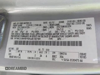 2013 Ford Escape SEL with VIN 1FMCU9H91DUA14749, listed as a IAAI auction lot 42039685 with 186,669 mi miles. Bid and sale history available at carsss.com. Image 9.