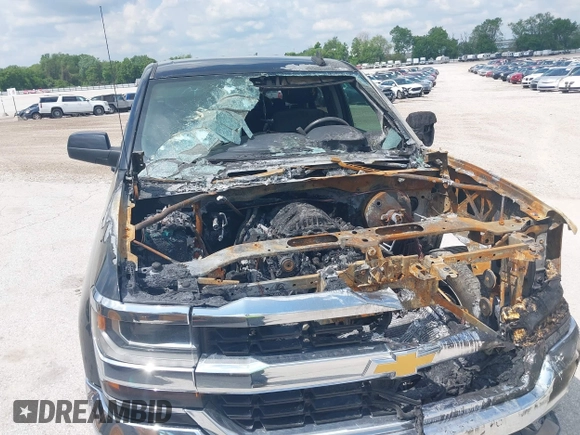 2017 Chevrolet Silverado 1500 LT with VIN 3GCUKREC2HG333665, listed as a IAAI auction lot 42238465 with 189,000 mi miles and . Bid and sale history available at DreamBid. Image 6.