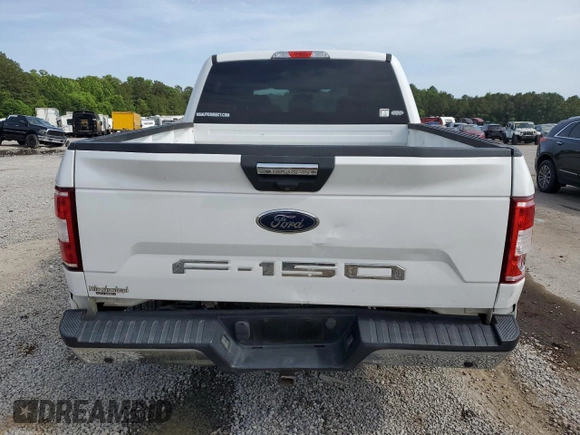 2018 Ford F-150 XL with VIN 1FTEW1E59JFA28036, listed as a Copart auction lot 57181525 with 121,384 mi miles and Salvage title. Bid and sale history available at DreamBid. Image 6.