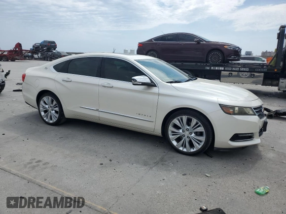2014 Chevrolet Impala LTZ with VIN 1G1155S39EU144262, listed as a Copart auction lot 50677645 with 69,957 mi miles and Salvage Title. Bid and sale history available at DreamBid. Image 4.