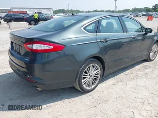 2015 Ford Fusion SE with VIN 3FA6P0HD2FR204844, listed as a IAAI auction lot 42488934 with 117,326 mi miles and . Bid and sale history available at DreamBid. Image 4.