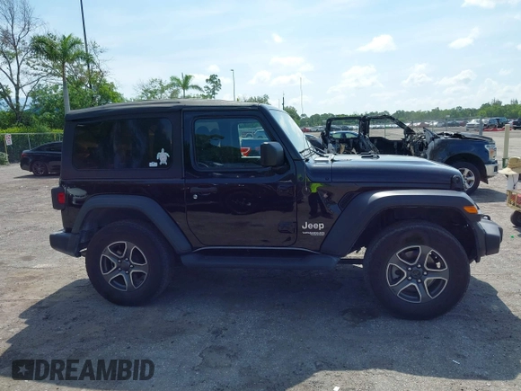 2019 Jeep Wrangler Sport S with VIN 1C4GJXAG2KW664395, listed as a IAAI auction lot 42683888 with 72,742 mi miles and . Bid and sale history available at DreamBid. Image 13.