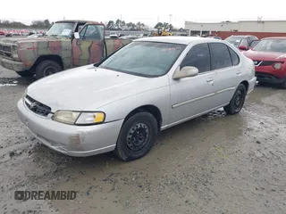 1999 Nissan Altima XE with VIN 1N4DL01D5XC180276, listed as a IAAI auction lot 41584645 with 248,376 mi miles. Bid and sale history available at carsss.com. Image 2.