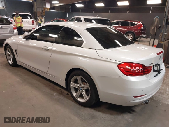 2015 BMW 4 Series 428i xDrive with VIN WBA3T1C52FP821020, listed as a IAAI auction lot 42004707 with 74,951 mi miles and . Bid and sale history available at carsss.com. Image 3.