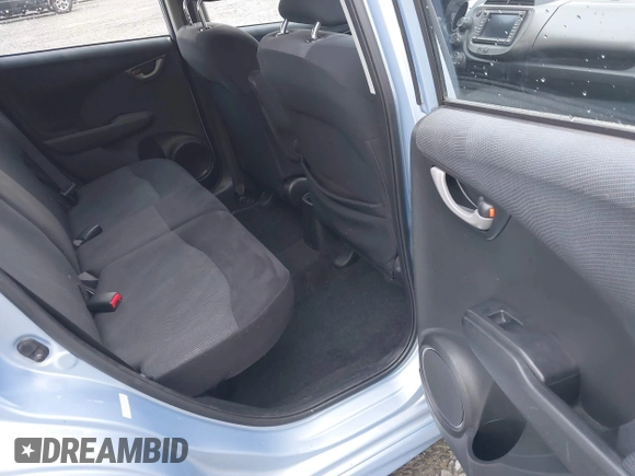 2009 Honda Fit Sport w/Navi with VIN JHMGE886X9S042490, listed as a IAAI auction lot 41931712 with 111,088 mi miles. Bid and sale history available at carsss.com. Image 8.