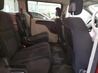 2014 Dodge Grand Caravan SXT z VIN 2C4RDGCG2ER239110, wystawiony jako Copart lot #57247855 z przebiegiem 94 126 mil mil oraz Nie do naprawy. Historia ofert i sprzedaży dostępna na DreamBid. Obrazek 11.