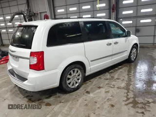 2015 Chrysler Town & Country Touring with VIN 2C4RC1BG0FR628721, listed as a IAAI auction lot 41101486 with 125,942 mi miles. Bid and sale history available at carsss.com. Image 4.