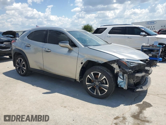2022 Lexus UX 200 with VIN JTHX3JBH7N2054100, listed as a Copart auction lot 56495695 with 70,979 mi miles and Salvage title. Bid and sale history available at DreamBid. Image 4.
