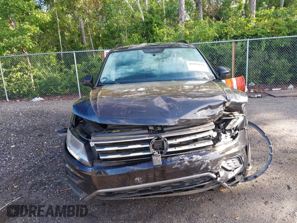 2020 Volkswagen Tiguan S z VIN 3VV1B7AX7LM133084, wystawiony jako IAAI lot #42597631 z przebiegiem 84 415 mil mil oraz . Historia ofert i sprzedaży dostępna na DreamBid. Obrazek 6.