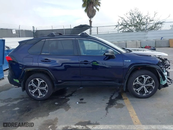 2023 Toyota RAV4 Prime XSE with VIN JTMEB3FV1PD121207, listed as a IAAI auction lot 41921704 with 55,125 mi miles. Bid and sale history available at carsss.com. Image 14.