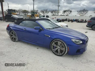 2013 BMW M6 z VIN WBSLZ9C53DDZ78160, wystawiony jako Copart lot #51946585 z przebiegiem 39 260 mil mil oraz Nie do naprawy • Non repairable. Historia ofert i sprzedaży dostępna na DreamBid. Obrazek 4.