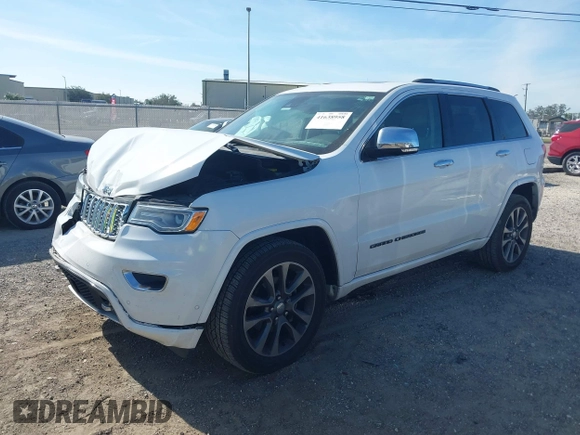 2017 Jeep Grand Cherokee Overland z VIN 1C4RJECG5HC959981, wystawiony jako IAAI lot #41638958 z przebiegiem 102 122 mil mil oraz . Historia ofert i sprzedaży dostępna na DreamBid. Obrazek 18.