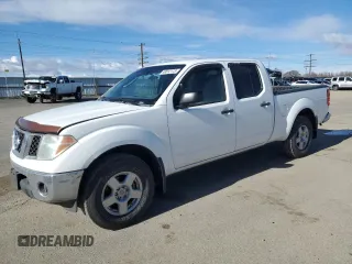 2007 Nissan Frontier SE with VIN 1N6AD09W47C404666, listed as a Copart auction lot 48812115 with 208,063 mi miles and Salvage title. Bid and sale history available at DreamBid. Image 1.