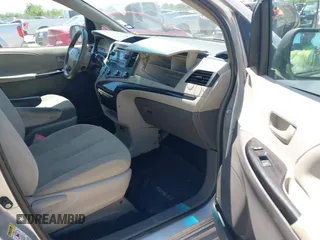 2014 Toyota Sienna L with VIN 5TDZK3DC1ES410012, listed as a IAAI auction lot 42005001 with 440,789 mi miles. Bid and sale history available at carsss.com. Image 5.