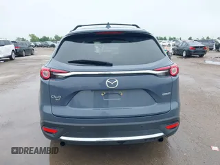 2021 Mazda CX-9 Grand Touring with VIN JM3TCBDY9M0534966, listed as a IAAI auction lot 42166071 with 77,817 mi miles and . Bid and sale history available at DreamBid. Image 16.
