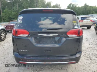 2020 Chrysler Pacifica Touring L with VIN 2C4RC1BG8LR133548, listed as a Copart auction lot 63272655 with 64,489 mi miles and Salvage title. Bid and sale history available at DreamBid. Image 6.