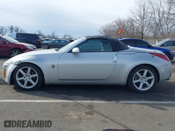 2005 Nissan 350Z Touring z VIN JN1AZ36A05M755776, wystawiony jako IAAI lot #41509506 z przebiegiem 79 148 mil mil oraz . Historia ofert i sprzedaży dostępna na DreamBid. Obrazek 14.