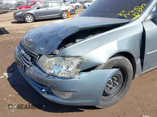 2003 Toyota Avalon XL z VIN 4T1BF28B33U293202, wystawiony jako IAAI lot #41768148 z przebiegiem 157 992 mil mil oraz . Historia ofert i sprzedaży dostępna na DreamBid. Obrazek 6.