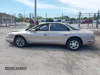 1999 Oldsmobile Aurora z VIN 1G3GR62C5X4114285, wystawiony jako IAAI lot #42271517 z przebiegiem 308 731 mil mil oraz . Historia ofert i sprzedaży dostępna na DreamBid. Obrazek 14.