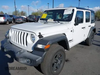 2022 Jeep Wrangler Unlimited Sport with VIN 1C4HJXDNXNW253510, listed as a IAAI auction lot 41461051 with 32,571 mi miles and . Bid and sale history available at DreamBid. Image 2.