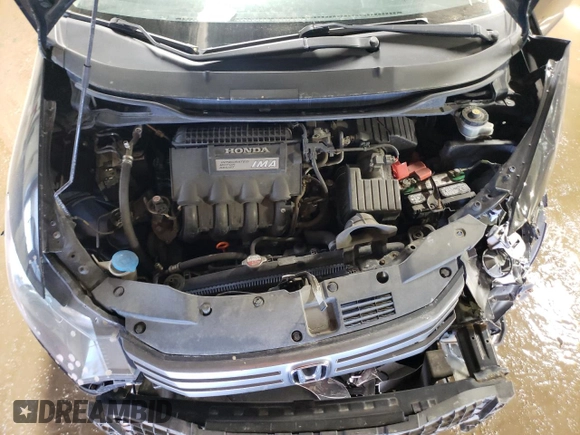 2011 Honda Insight LX z VIN JHMZE2H54BS009715, wystawiony jako Copart lot #48790825 z przebiegiem 219 867 mil mil oraz Szkoda całkowita • Salvage title. Historia ofert i sprzedaży dostępna na DreamBid. Obrazek 11.