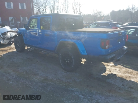 2021 Jeep Gladiator Willys with VIN 1C6HJTAG3ML572690, listed as a IAAI auction lot 41649907 with 74,734 mi miles and . Bid and sale history available at DreamBid. Image 3.