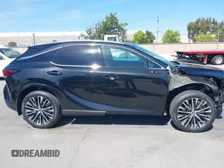 2023 Lexus RX 350h z VIN 2T2BBMCA1PC005914, wystawiony jako IAAI lot #42200587 z przebiegiem 22 480 mil mil oraz . Historia ofert i sprzedaży dostępna na DreamBid. Obrazek 14.