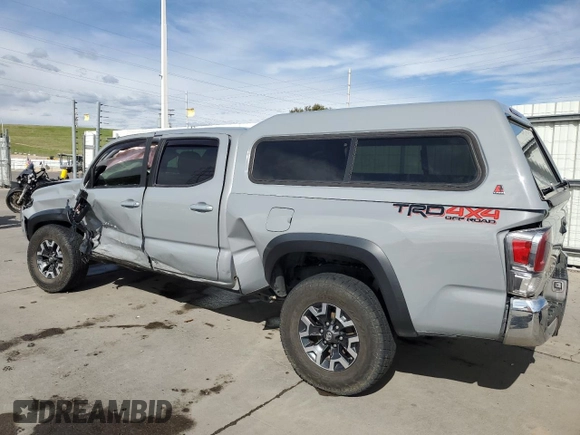 2020 Toyota Tacoma SR5 with VIN 3TMDZ5BN6LM097302, listed as a Copart auction lot 57503895 with 77,212 mi miles and Salvage title. Bid and sale history available at DreamBid. Image 2.