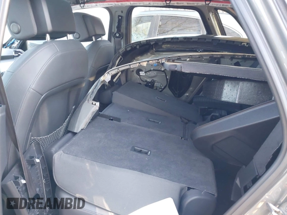 2021 Audi Q3 Premium with VIN WA1AUCF34M1099668, listed as a IAAI auction lot 41990226 with 69,866 mi miles and . Bid and sale history available at DreamBid. Image 8.