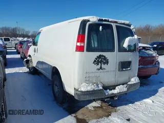 2018 Chevrolet Express Cargo Van with VIN 1GCWGAFG1J1195263, listed as a IAAI auction lot 41287882 with 71,475 mi miles. Bid and sale history available at carsss.com. Image 3.